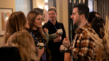 IAB UK members chatting at networking event